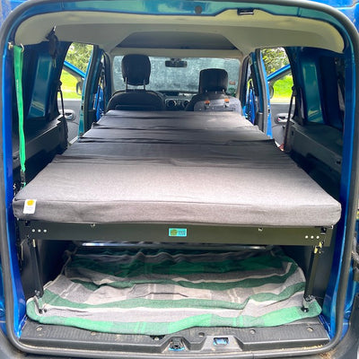 Photo of the camping bed in the trunk.