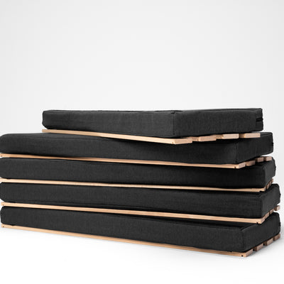 Five mattress parts with slatted frame.